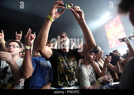 Athens, Greece. 16th July, 2018. People listen German rock band, Scorpions performing in a concert titled 'Once in a Lifetime' at the Panathenaic stadium in Athens, Greece, 16 July 2018.   ©Elias Verdi/Alamy Live News Stock Photo