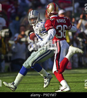 San Francisco, California, USA. 23rd Sep, 1990. San Francisco 49ers vs  Atlanta Falcons at Candlestick Park Sunday, September 23, 1990. 49ers beat  Falcons 19-13. 49er wide receiver Mike Wilson (85) attempts to