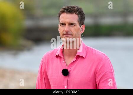 Charmouth, Dorset, UK.  17th July 2018.  Dan Snow during the filming of BBC4's Beach Live, Jurassic Coast Revealed at Charmouth beach in Dorset with presenters historian Dan Snow and natural history experts Lucy Cooke and Niall Strawson.  This was the first one hour live programme of three over 3 evenings which finishes on the 19th July.  Picture Credit: Graham Hunt/Alamy Live News Stock Photo