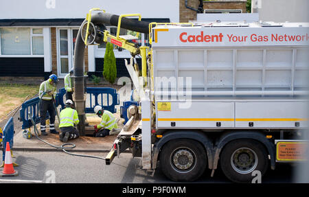 Birmingham, UK. 17th July 2018. General view Cadent employees operating a vacuum truck to suck up soil as they prepare to replace old iron gas pipes with more durable plastic yellow pipes in Birmingham, Tuesday July 17, 2018. Cadent, formerly known as National Grid Gas Distribution, are carrying out essential gas maintenance in the road. Motorists have been warned to expect delays and to find an alternative route if possible. Credit: NexusPix/Alamy Live News Stock Photo