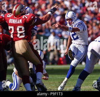 Kicker Mike Vanderjagt, of the Indianapolis Colts, embraces kicker Adam  Vinatieri, of the New England Patriots, following the Patriots victory over  the Colts, in the AFC Championship Game, Sunday, January 18, 2004