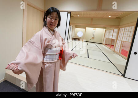 An instructor wearing traditional Japanese kimono poses for a photograph in a customized room for English students during a media event at Tokyo Global Gateway on July 18, 2018, Tokyo, Japan. Tokyo Global Gateway is a large-scale educational project for elementary to senior high school students to improve their English communication skills giving them access to foreign instructors in different daily situations. The project is supported by the Tokyo Metropolitan Board of Education and will officially open on September 6th, 2018. Credit: Rodrigo Reyes Marin/AFLO/Alamy Live News Stock Photo