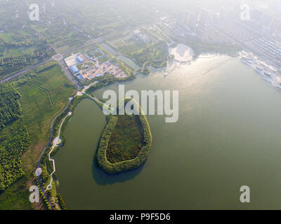 Rugao, Rugao, China. 18th July, 2018. Rugao, CHINA-Aerial photography of Longyou Lake in Rugao, east China's Jiangsu Province. Credit: SIPA Asia/ZUMA Wire/Alamy Live News Stock Photo