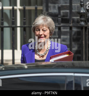 Downing Street, London, UK. 18 July, 2018. British Prime Minister Theresa May leaves Downing Street to attend the final Prime Ministers Questions at the Houses of Parliament before summer recess. Credit: Malcolm Park/Alamy Live News. Stock Photo