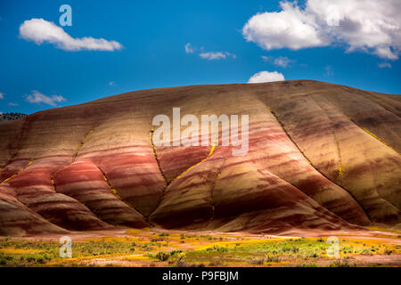 A view of the Oregon Painted Hills from the side of the road entering the site. Located near MItchell Oregon. Stock Photo