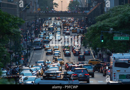 Congestion of pedestrians and cars in Manhattan, New York City. Stock Photo