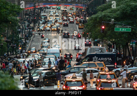 Congestion of pedestrians and cars in Manhattan, New York City. Stock Photo