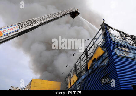 Fire fighters in action Stock Photo