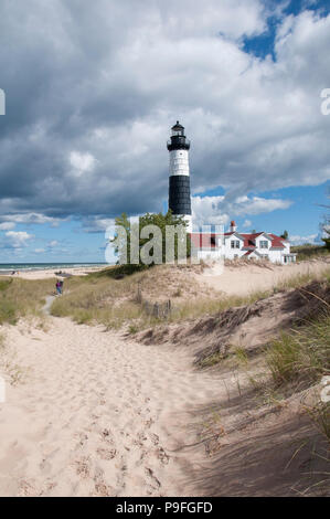 Big Sable Point Lighthouse on the shore of Lake Michigan in the Ludington State Park near Ludington, Michigan. 112 ft black and white tower. Stock Photo