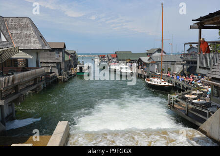 Fishtown in Leland, Michigan is a restored fishing village with shops and restaurants filling the shanties. Stock Photo