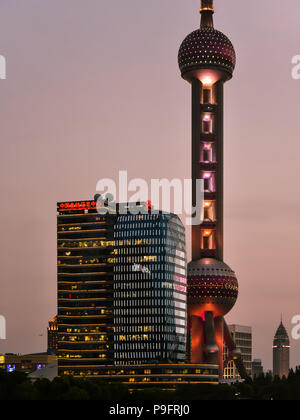 New Pudong, Shanghai/China - Apr. 24, 2018: Early evening view of Oriental Pearl Radio & TV Tower, Shanghai, China. Stock Photo