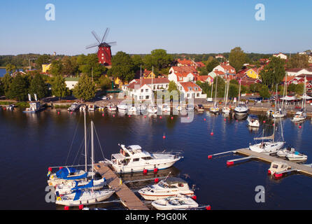 Strangnas, Sweden - July 16, 2018: Aerial view of the marina in the city center with a red windmill in the background. Stock Photo