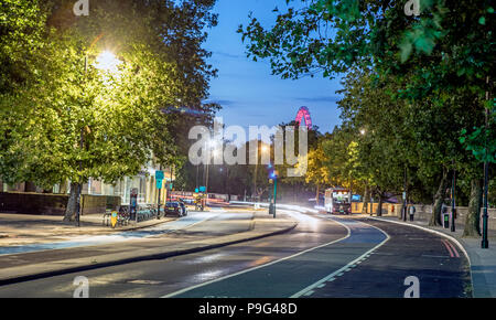 Traffic On Victoria Embankment at Night London UK Stock Photo