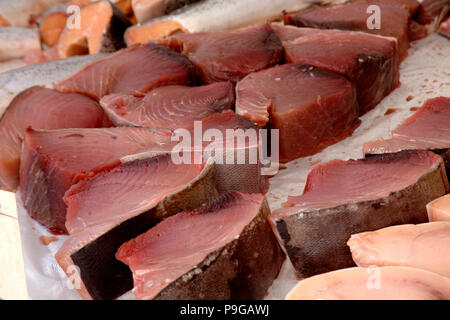 Fresh yellowfin tuna steaks being sold on Haymarket farmers market in Boston, MA Stock Photo
