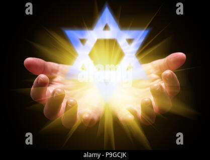 Hands cupped and holding or showing the Star of David. Magen David or Seal of Solomon with bright, glowing, shining light. Concept for Judaism, Jew, H Stock Photo