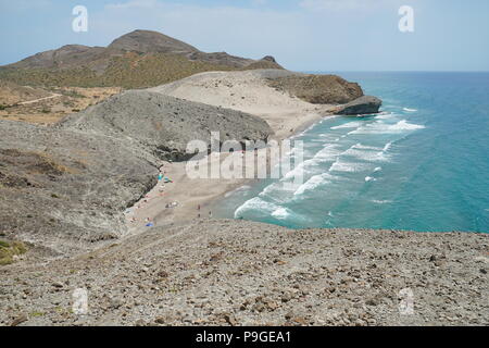Sandy beach and volcanic rock formation, Playa de Mónsul, Cabo de Gata-Níjar natural park, Mediterranean sea, Almeria, Andalusia, Spain Stock Photo