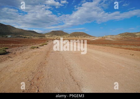 Landscape in the Cabo de Gata-Níjar natural park, track near San José, Almeria, Andalusia, Spain Stock Photo