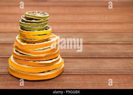 dried citrus on wooden background Stock Photo