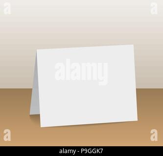 Realistic white blank folded paper card standing on wooden table top - vector Stock Vector