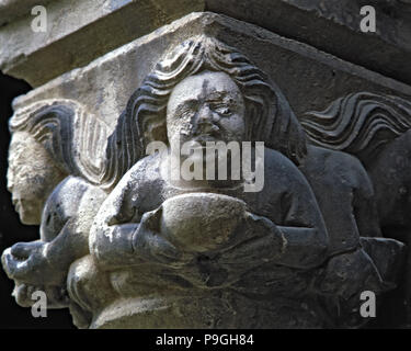 Capital of one of the Gothic galleries of the cloister built between 1387-1401. Female figure wit… Stock Photo