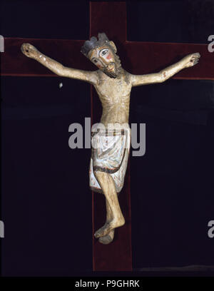 'Christ of Solsona', polychromed wood carving, Christ crucified with feet together by a single n… Stock Photo