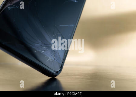 crashed smartphone or phone with broken LCD glass display Stock Photo