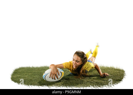 The young female rugby player isolated on white backround Stock Photo