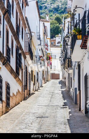 Narrow street in old Ubrique town, Cadiz Province, Spain Stock Photo