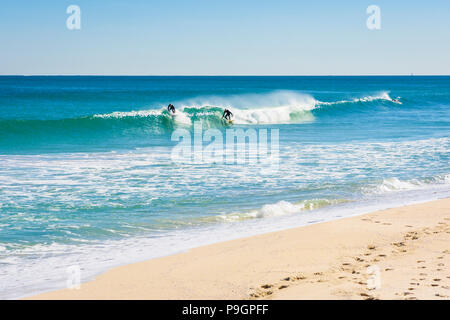 Surfers riding small waves at the beach break, Scarborough Beach, Perth, Western Australia Stock Photo