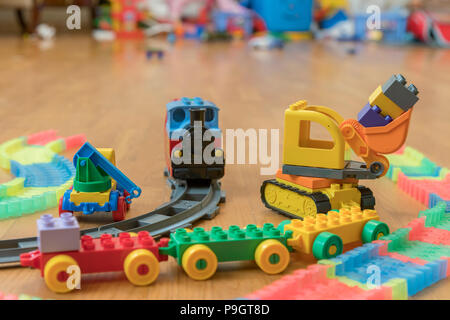 Children's road and cars on the floor in the room. Stock Photo