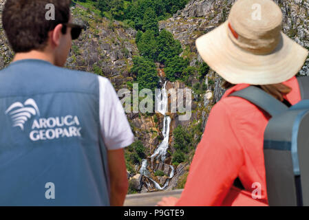 Arouca Geopark Guide and tourist looking to waterfall from Passadicos do Paiva Stock Photo