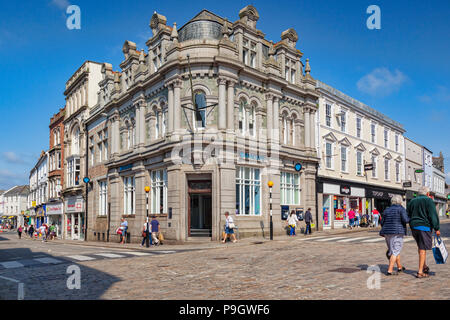 12 June 2018: Truro, Cornwall, UK - Shopping in the town centre, with Barclays Bank, on the corner of King Street and St Clement Street. Stock Photo