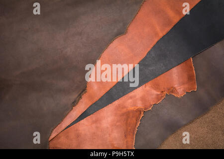 Texture of pieces brown leather. Natural material background Stock Photo