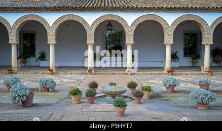 Cordoba Patios Architecture with arches in landscaped courtyard gardens, Spain Stock Photo