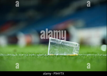 Plastic trash can on the turf on a soccer field Stock Photo