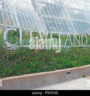 'Cleveland', part of the exterior Cleveland Botanical Gardens sign in front of the large greenhouse in the University Circle area of Cleveland, Ohio. Stock Photo