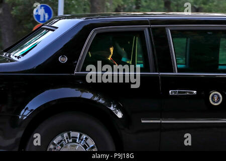 U.S. President Donald Trump smiles and waves from the Presidential limousine. Helsinki, Finland - July 15, 2018. Credit: Taina Sohlman/Alamy Stock Photo