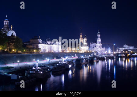 Dresden during night with view on the cityskyline and elbe river from the bridge of Augustus Stock Photo