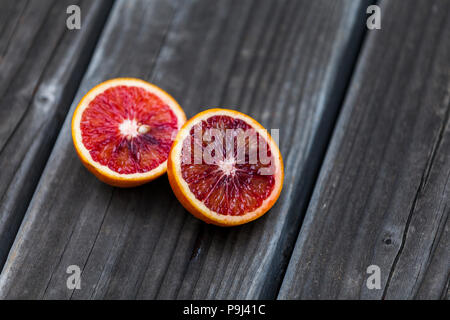 Blood orange and wood. Stock Photo