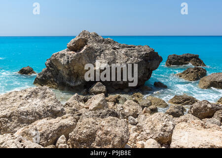 Seascape with rocks in blue waters of Megali Petra Beach, Lefkada, Ionian Islands, Greece Stock Photo