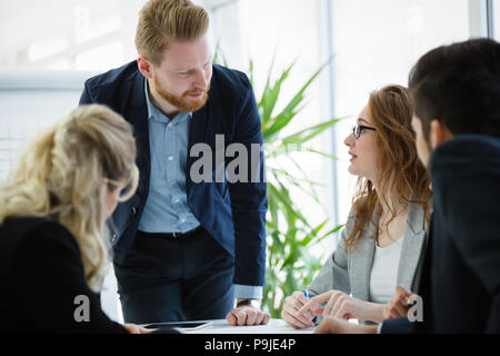 Young smart business people meeting in business office Stock Photo