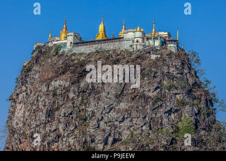 Mount Popa with a Buddhist pagodas on the summit, Myanmar. Stock Photo