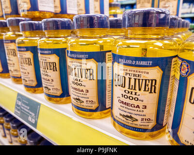 Cod liver oil capsules in Holland & Barrett, UK Stock Photo