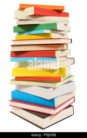 Very tall pile of books isolated on white background Stock Photo