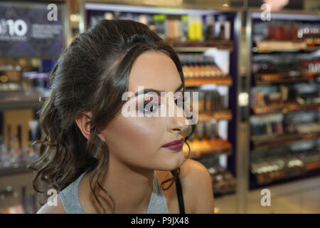 Teenage Girl Having Make Up Applied For Prom Stock Photo