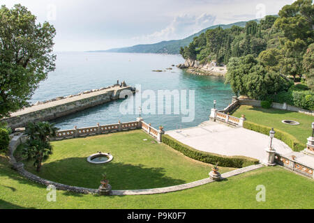 Europe, Italy, Friuli-Venezia Giulia, Trieste. Miramare Castle (Castello Miramare) - panorama view with beautiful garden and Adriatic sea coast. Stock Photo