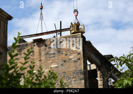 Ongoing work continues to dismantle the Glasgow School of Art's Mackintosh building, after a second fire damaged the site at the start of July. Stock Photo