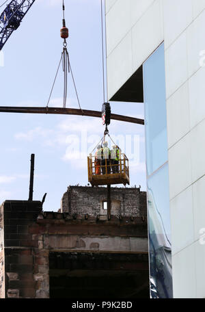 Ongoing work continues to dismantle the Glasgow School of Art's Mackintosh building, after a second fire damaged the site at the start of July. Stock Photo