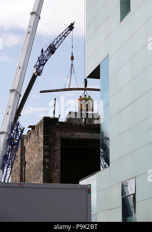 Ongoing work continues to dismantle the Glasgow School of Art's Mackintosh building, after a second fire damaged the site at the start of July. Stock Photo