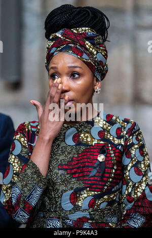 Zamaswazi Dlamini-Mandela, grand-daughter of Nelson Mandela, wipes away tears as she attends a service to mark the centenary of the birth of the former South African President at Westminster Abbey in London where a memorial stone was dedicated to the late South African Leader. Stock Photo
